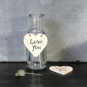 Heart shaped sign with the words Love you