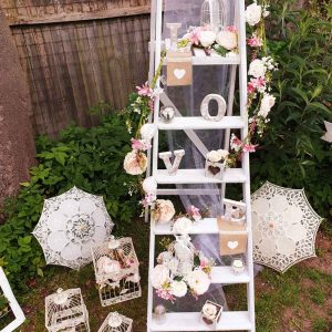 flowered ladder with mini props